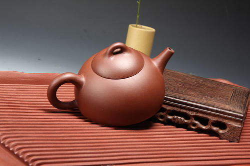 什么样的紫砂壶才是纯手工紫砂壶？  4
