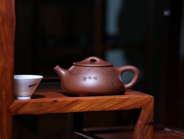 为什么泡茶用紫砂壶比较好？
