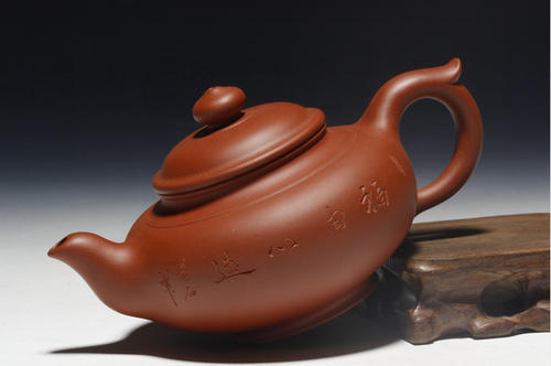 真正的紫砂壶用沸水泡茶到底烫不烫手?
